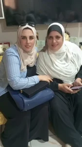 الحاجه عزيزة مع صحفية " الحرية"