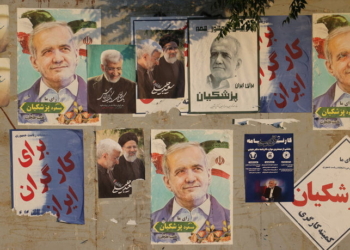 Posters of presidential candidates Masoud Pezeshkian and Saeed Jalili are displayed in a street in Tehran, Iran June 22, 2024. Majid Asgaripour/WANA (West Asia News Agency) via REUTERS ATTENTION EDITORS - THIS PICTURE WAS PROVIDED BY A THIRD PARTY
