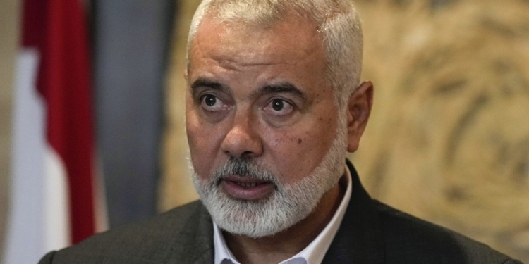FILE - Ismail Haniyeh, leader of the Palestinian militant group Hamas, speaks to journalists after his meeting with Lebanese Parliament Speaker Nabih Berri, in Beirut, Lebanon, June 28, 2021. (AP Photo/Hassan Ammar, File)