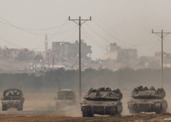 Israeli tanks re-enter Israel from Gaza, amid the ongoing conflict between Israel and the Palestinian Islamist group Hamas, near the Israel-Gaza border, in southern Israel, January 11, 2024. REUTERS/Tyrone Siu