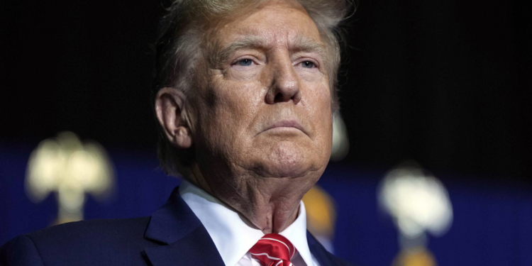 FILE - Republican presidential candidate former President Donald Trump speaks at a campaign rally, March 9, 2024, in Rome Ga. Trump's lawyers kept pressing an appellate court Wednesday, March 20, to excuse him from covering a $454 million fraud lawsuit judgment for now, saying he'd suffer “irreparable harm" before his appeal is decided. (AP Photo/Mike Stewart, File)