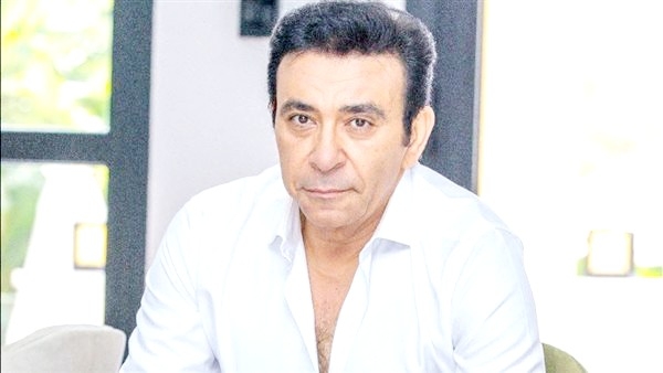 الإعلامي عاطف كامل