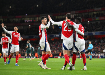 LONDON, ENGLAND - DECEMBER 11: Kai Havertz of Arsenal celebrates scoring his team's third goal with teammates Mikel Merino and Bukayo Saka during the UEFA Champions League 2024/25 League Phase MD6 match between Arsenal FC and AS Monaco at Emirates Stadium on December 11, 2024 in London, England. (Photo by David Price/Arsenal FC via Getty Images)